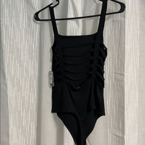 Black, open back caged bodysuit
